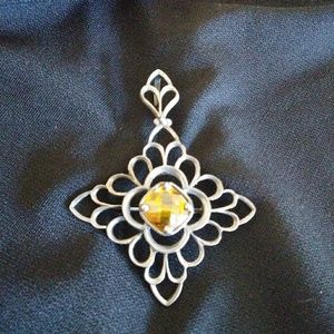 Silpada pendant and pin.